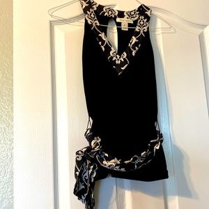 Sleeveless black with damask trim and matching belt